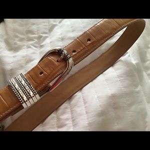 Tan Brighton belt with silver buckle.  Late